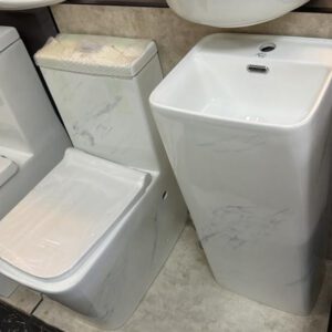 Ensemble lavabo et WC effet marbre avec vasque ovale