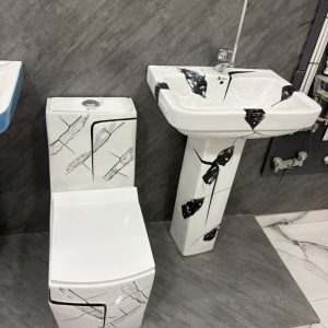 Ensemble WC et lavabo blanc à motif noir